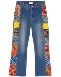 Alice + Olivia - Jeans Svasati Con Design Patchwork - Lyst