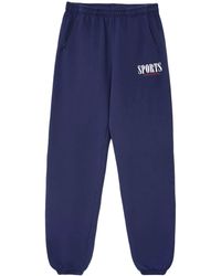 Sporty & Rich - Pantalones de chándal con logo estampado - Lyst