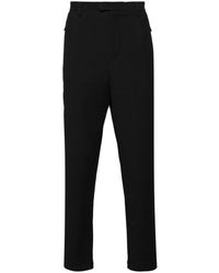 Emporio Armani - Pantalones ajustados de tejido seersucker - Lyst