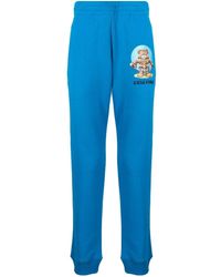 Moschino - Pantalon de jogging en coton à logo imprimé - Lyst