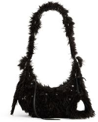 Balenciaga - Sac porté épaule Le Cagole XS en fourrure artificielle - Lyst