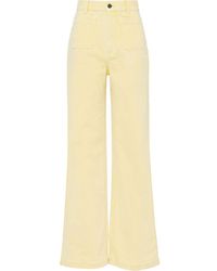 Miu Miu Vaqueros de talle alto acampanados - Amarillo