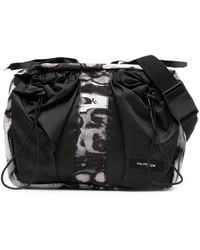 ISO.POETISM - Abstract-Print Panelled Shoulder Bag - Lyst