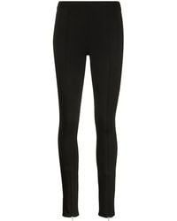 Calvin Klein - Logo-Embroidered Cuff-Zip Leggings - Lyst