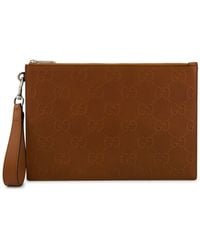 Gucci - GG Embossed Leather Pouch - Lyst