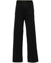 Palm Angels - Knitted Flared Trousers - Lyst