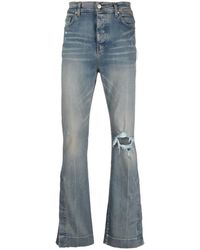 Amiri - Ripped-Detail Bootcut Jeans - Lyst