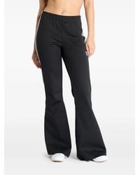adidas - Stripe-Detail Flared Trousers - Lyst