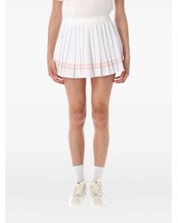 Sporty & Rich - Vendome Script Pleated Mini Skirt - Lyst
