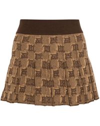 MISBHV - Monogram-jacquard Pleated Mini Skirt - Lyst