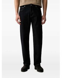 Guess - Logo-Patch Pocket Jeans - Lyst