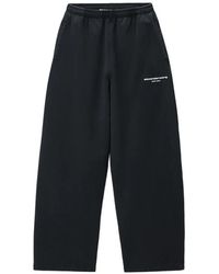 Alexander Wang - Logo-Print Mid-Rise Relaxed Sweatpants - Lyst