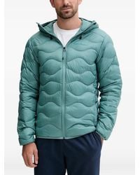 Peak Performance - Helium Gewatteerd Jack Met Capuchon - Lyst