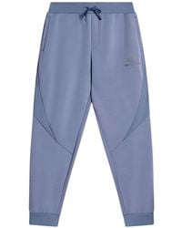 Guess - Logo-Print Cuffed Track Pants - Lyst