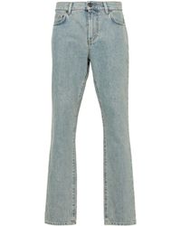 Moschino - Straight Jeans With A Faded Effect - Lyst