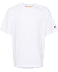 Champion - T-Shirt mit Logo-Stickerei - Lyst