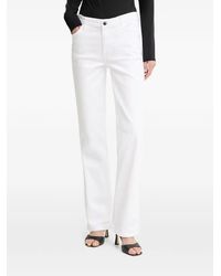 Guess - Straight-Leg-Jeans Mit Logo-Patch - Lyst