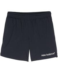New Balance - Logo-embroidered Track Shorts - Lyst