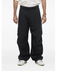 Studio Nicholson - Padded Elasticated-Waist Trousers - Lyst