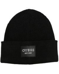 Guess - Logo-Patch Ribbed-Knit Beanie Hat - Lyst