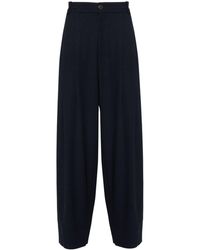 Studio Nicholson - Pleated Tapered Trousers - Lyst