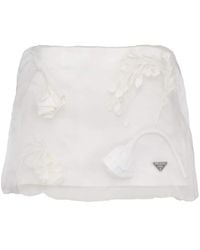 Prada - Minifalda con aplique floral - Lyst