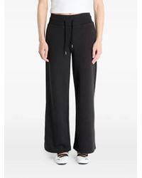 PUMA - Wardrobe Essentials Relaxed-Fit Track Pants - Lyst