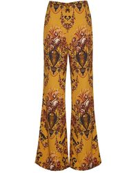Cara Cara - Ausgestellte Pisa Hose mit Blumen-Print - Lyst