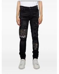 Amiri - Paint-Splatter Patched Jeans - Lyst