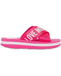 Love Moschino - Pantoletten mit Logo-Print - Lyst