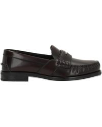 Prada - Logo-Plaque Penny Loafers - Lyst