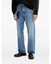 Bluemarble - Twisted-Seams Logo-Print Jeans - Lyst