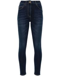 Elisabetta Franchi - Skinny-Jeans mit Logo-Schild - Lyst