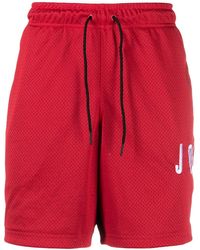 red nike sweat shorts