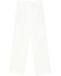 Rohe - Pleated Wool-Blend Trousers - Lyst