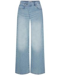 FRAME - The Crossover Loose Wide-Leg Jeans - Lyst