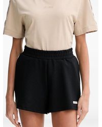 Guess - Short Rayé À Patch Logo - Lyst