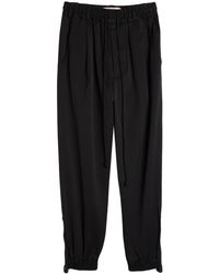 Song For The Mute - Logo-patch Tapered-leg Trousers - Lyst