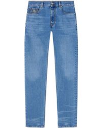 Versace - Medusa Head-Embellished Mid-Rise Slim-Fit Jeans - Lyst