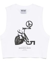 Moschino - Top corto con logo estampado - Lyst