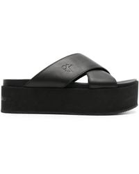 Calvin Klein - Logo-Debossed Flatform Slides - Lyst