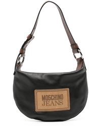 Moschino Jeans - Sac porté épaule en cuir à patch logo - Lyst