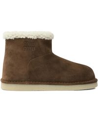 Miu Miu - Logo-Detail Shearling Boots - Lyst
