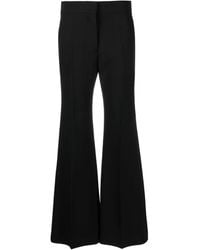 Givenchy - Flared-Leg Wool Trousers - Lyst