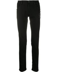 Dolce & Gabbana - Skinny Jeans With Logo Embellishment - Lyst