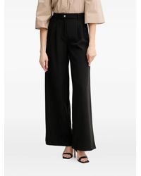 Guess - Pantaloni Con Piega - Lyst