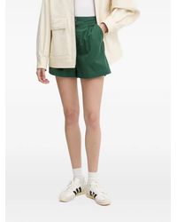 Columbia - Acker Rock Pleated Logo-Patch Shorts - Lyst