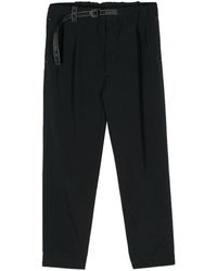 and wander - Belted Tapered-leg Trousers - Lyst