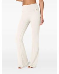 AMADAWEAR - Camilla Flared Leggings - Lyst