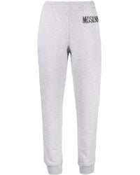 Moschino - Logo-Print Track Trousers - Lyst